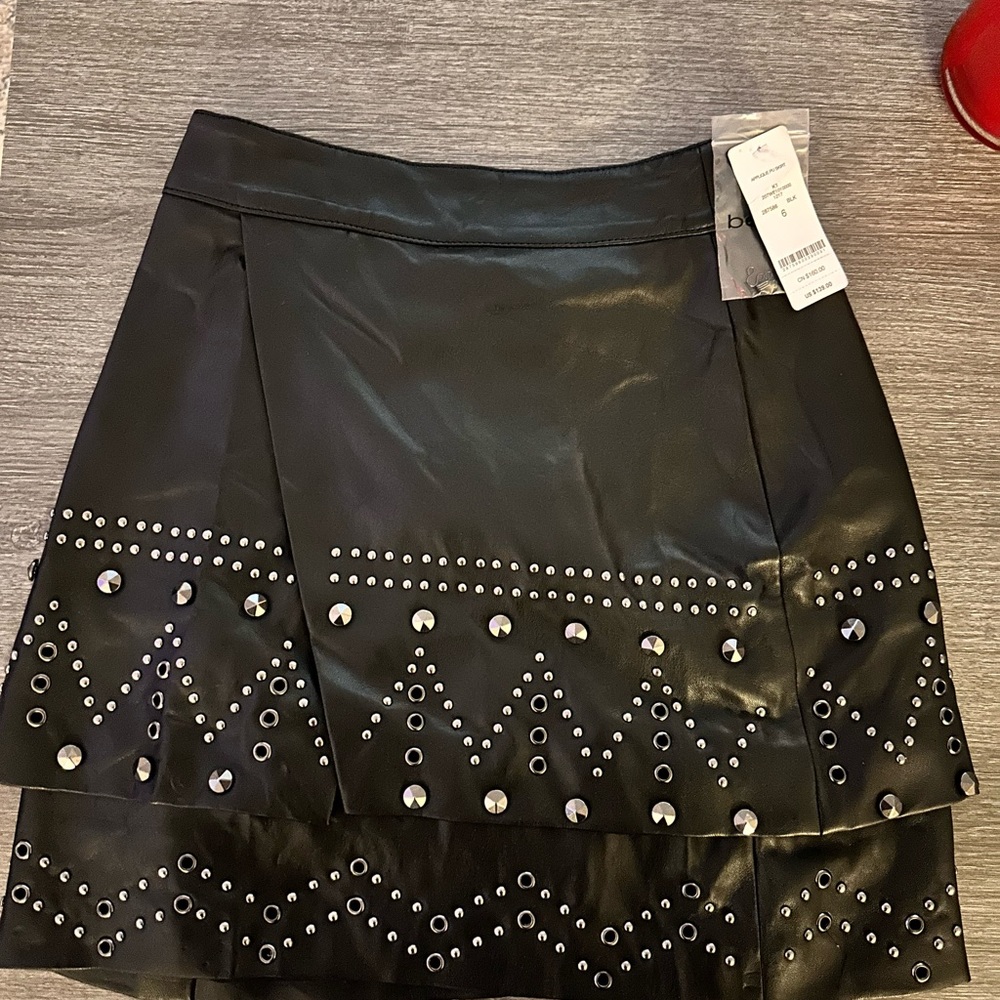 Bebe pleather skirt with studs size 6